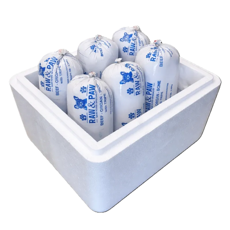 A case of six 5lb Raw & Paw beef, organ and tripe raw dog food chubs packed in an insulated shipping cooler